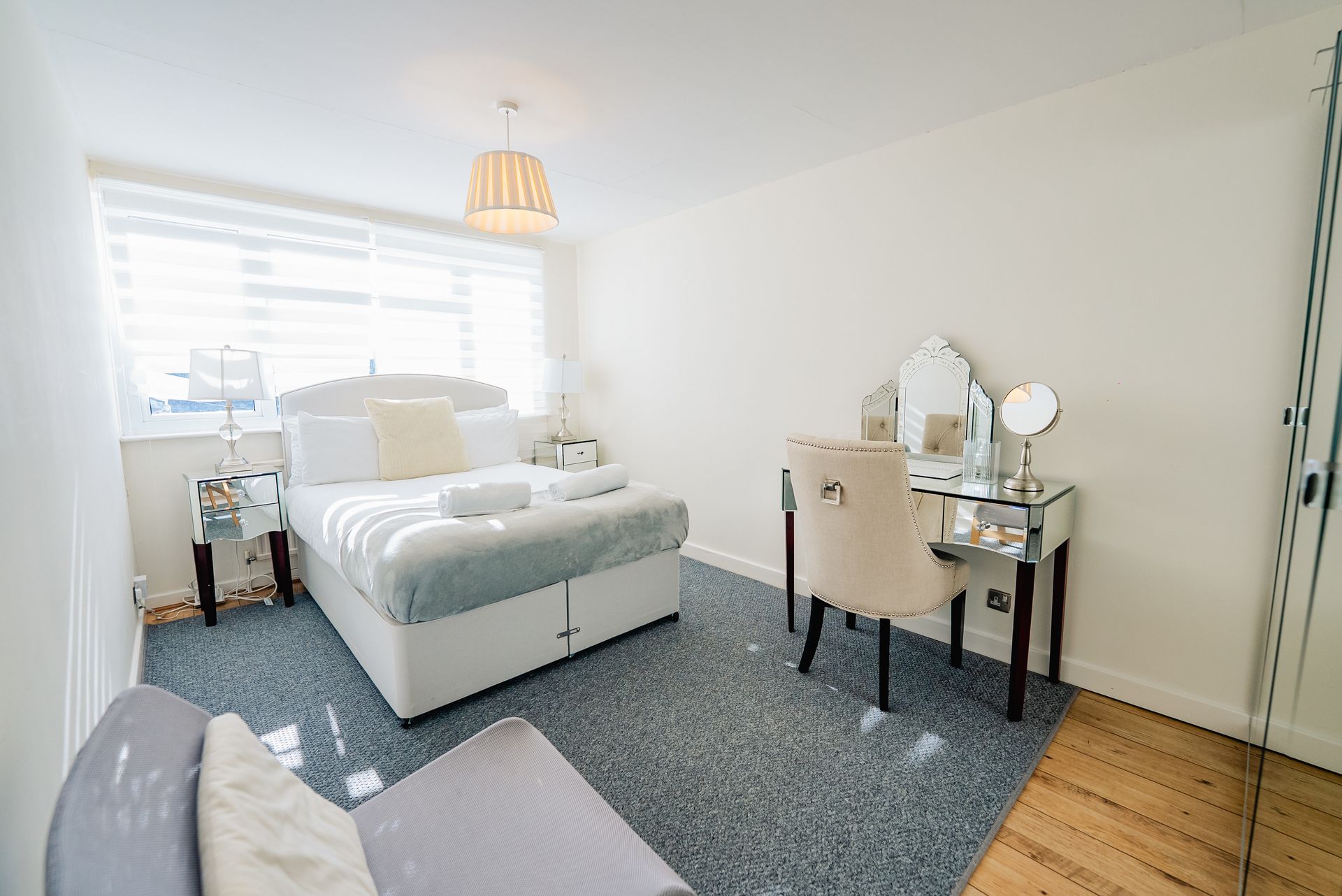Bright professionally prepared bedroom in a managed Cardiff home